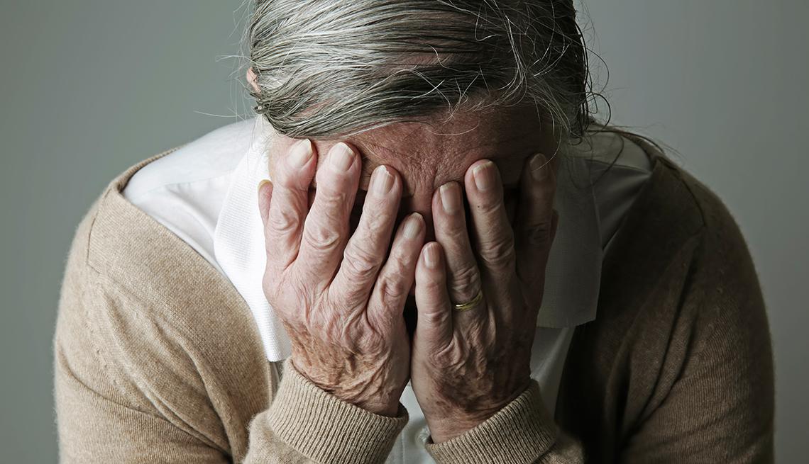 1140-alzheimer-myths-woman-hiding-face-esp.imgcache.rev944f06ecb6074b65cbe2f25784408cf5